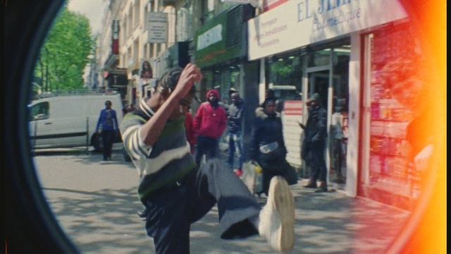 Video Reference: transport, street, snapshot, pedestrian, vehicle, interaction, road, city, car, girl, Person