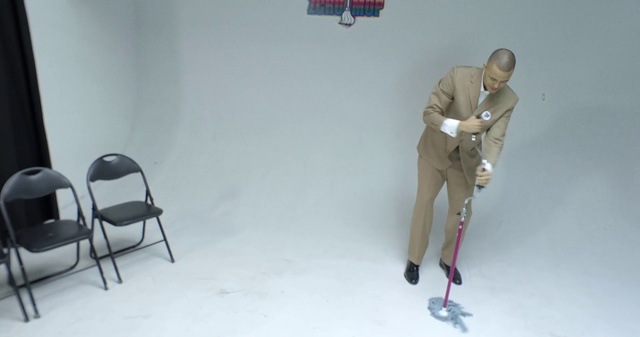 Video Reference: Room, Floor, Table, Furniture, Chair, Art, Sitting, Flooring, Sculpture