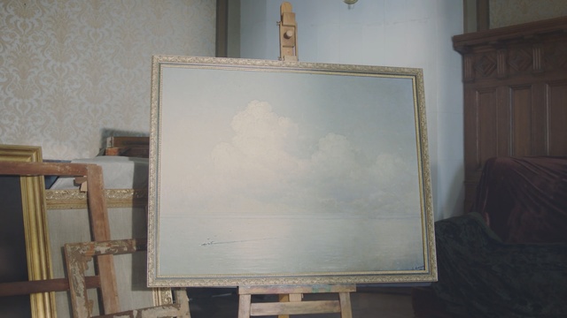 Video Reference: furniture, picture frame, paint, window, Person