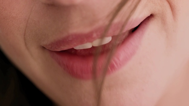 Video Reference: lip, skin, chin, cheek, close up, mouth, eyelash, smile, neck, tongue