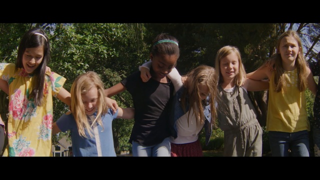 Video Reference: social group, girl, tree, fun, crowd, product, screenshot, friendship, plant, grass, Person