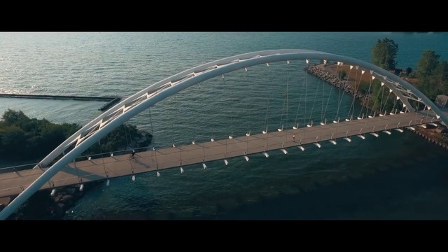 Video Reference: Arch bridge, Tied-arch bridge, Bridge, Fixed link, Water, Skyway, Architecture, Cable-stayed bridge, Sky, Infrastructure