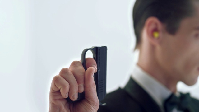 Video Reference: Nose, Hand, Finger, Ear, Technology, Photography, Neck, Gesture, Gadget, Businessperson