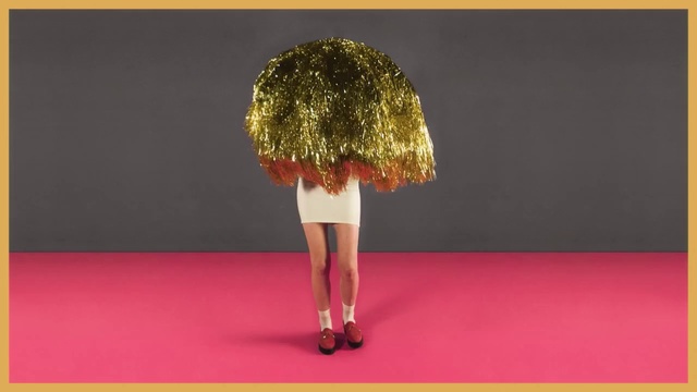 Video Reference: Red, Fashion, Yellow, Flooring, Dress, Red carpet, Footwear, Carpet, Floor, Photography, Text, Doll, Clothing