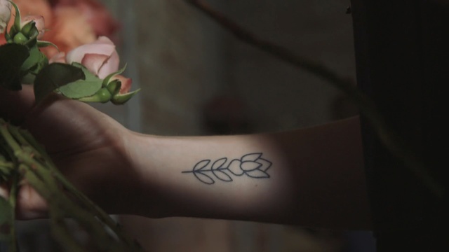 Video Reference: hand, arm, finger, temporary tattoo, flower, tattoo, plant, font, Person