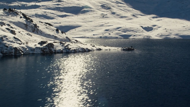 Video Reference: sea, water, coastal and oceanic landforms, coast, sky, ocean, fjord, glacial landform, mountain, lake