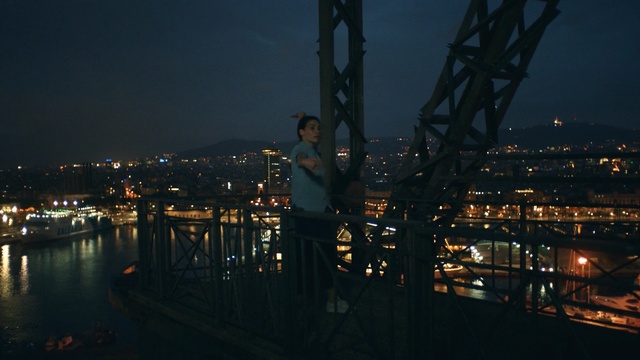 Video Reference: reflection, night, sky, city, water, urban area, waterway, darkness, skyline, cityscape