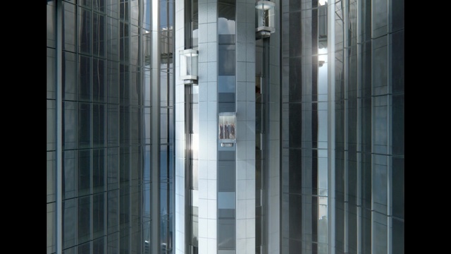 Video Reference: Architecture, Glass, Building, Reflection, Metropolitan area, Urban area, Line, Window, Facade, Transparent material, Indoor, Door, Tiled, Shower, Large, Public, Standing, Stall, Sitting, Walking, Black, Tall, White, Restroom, Clear, Room, Group, Sink, Street, Rain, Skyscraper, Bathroom, City