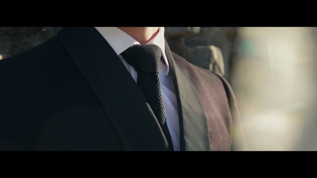 Video Reference: suit, formal wear, gentleman, necktie, outerwear, screenshot, tuxedo, Person