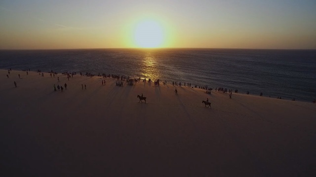 Video Reference: horizon, sky, sea, sunrise, sunset, sun, calm, ocean, shore, sand