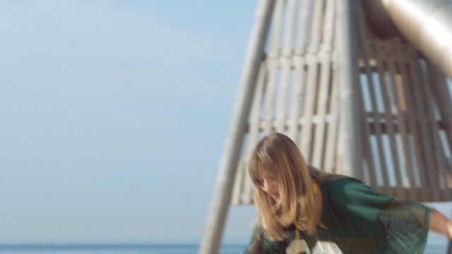 Video Reference: sky, vacation, tourism, travel, girl, sea, leisure, fun, Person