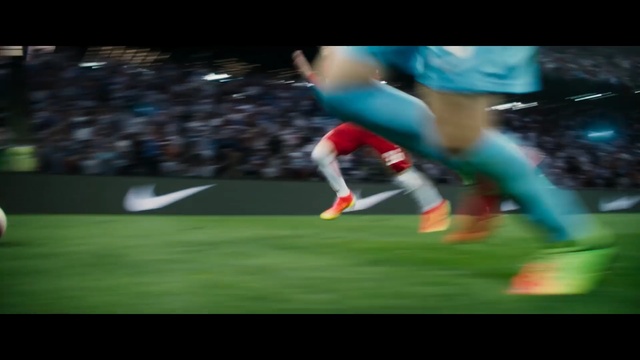 Video Reference: Football player, Football, Sport venue, Player, Ball, Soccer, Ball game, Sports equipment, Sports, Soccer ball, Grass, Person, Photo, Man, Riding, Field, Game, Playing, Woman, Blurry, Wearing, Holding, Flying, Board, Air, Young, Street, Blue, Night, Red, Standing, White, People