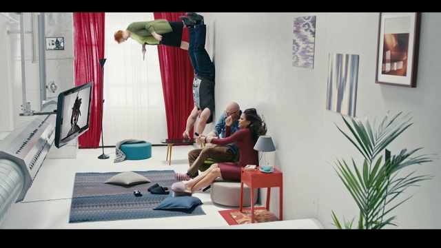 Video Reference: Design, Room, Photography, Furniture, Sitting, Interior design, Plant, Leisure, Vacation, Person, Indoor, Table, Living, Window, Photo, Bed, Computer, Desk, White, Woman, Area, Laptop, Red, Man, Young, Holding, Bedroom, Laying, Playing, Standing, Kitchen, Wall, Clothing, Footwear, Text, Chair, Dining table