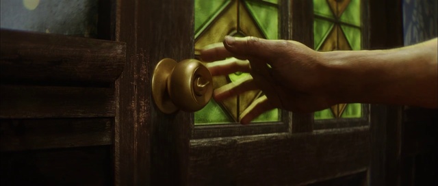 Video Reference: Door handle, Hand, Door, Wood, Finger, Lock, Hardware accessory, Window, Metal, Person, Indoor, Building, Man, Sitting, Holding, Standing, Green, Wooden, Mirror, White