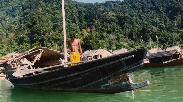 Video Reference: ship, vessel, boat, bridge, suspension bridge, water, sea, shipwreck, structure, Person