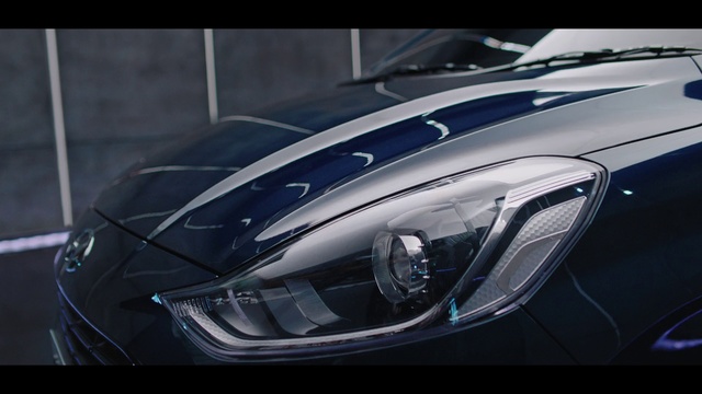 Video Reference: Land vehicle, Vehicle, Car, Automotive design, Headlamp, Automotive lighting, Light, Luxury vehicle, Hood, Helmet, Sitting, Black, Table, Desk, Computer, Motorcycle, White, Blue, Silver, Parked, Red, Mirror, Man, Standing, Luggage, Automotive, Auto part, Wheel, Supercar