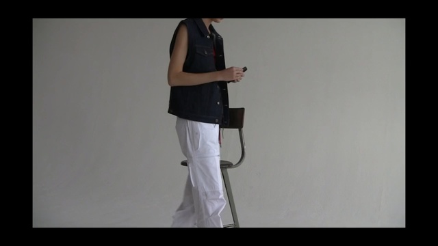 Video Reference: Shoulder, Arm, Standing, Joint, Leg, Human body, Photography, Neck, Elbow, Trousers