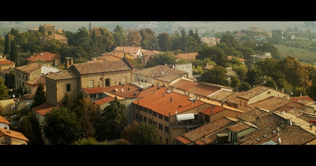 Video Reference: town, urban area, residential area, village, sky, suburb, city, neighbourhood, tree, house