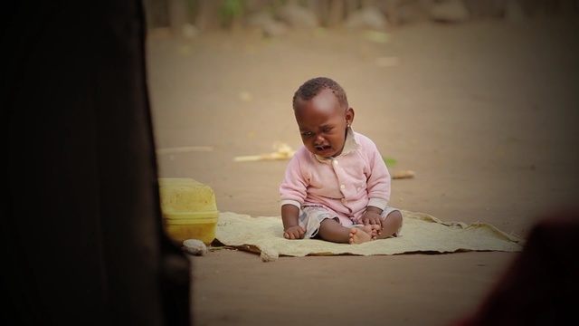 Video Reference: photograph, yellow, person, child, sitting, snapshot, girl, human, fun, temple