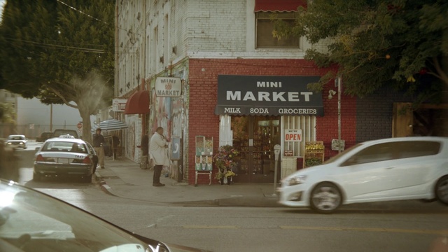 Video Reference: Land vehicle, Vehicle, Car, Mode of transport, Urban area, Mid-size car, Wall, Road, Street, Lane