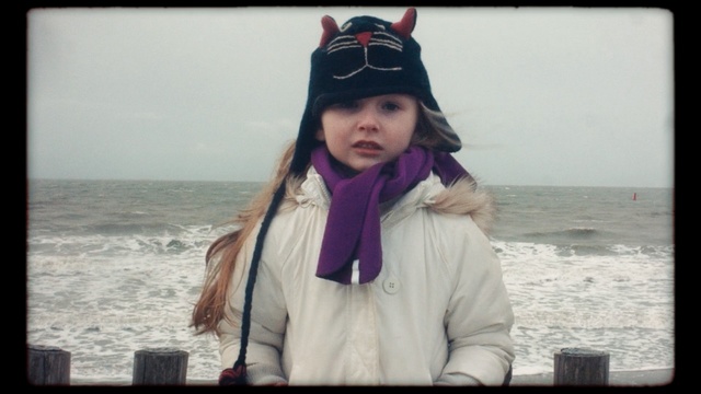 Video Reference: purple, girl, winter, headgear, fun, cool, vacation, hair accessory, snow, cap, Person