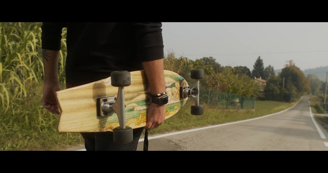 Video Reference: yellow, skateboard, longboard, longboarding, skateboarding, skateboarding equipment and supplies, tree, vehicle, grass, freebord