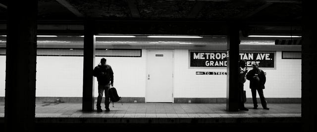 Video Reference: white, black, photograph, black and white, infrastructure, standing, urban area, street, photography, snapshot, Person