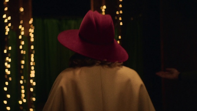 Video Reference: Headgear, Fun, Darkness, Performance, Hat, Event, Fashion accessory, Night, Magenta