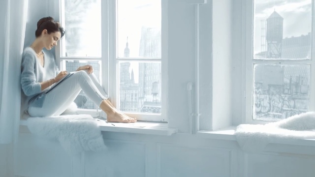 Video Reference: White, Sitting, Light, Room, Furniture, Bed, Leg, Interior design, Morning, Bed sheet, Person