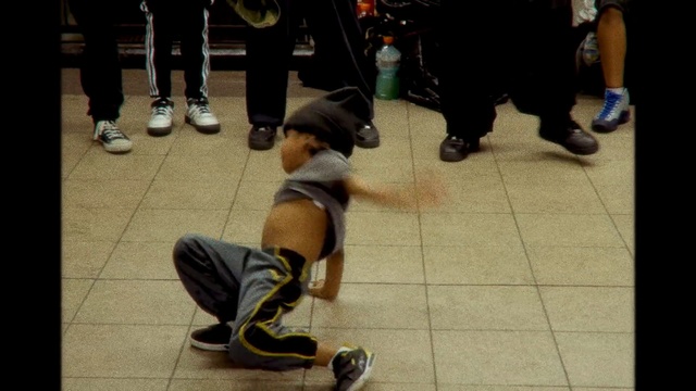 Video Reference: Leg, Footwear, Fun, Human leg, Photography, Shoe, Dance, Street, Performance, Crowd