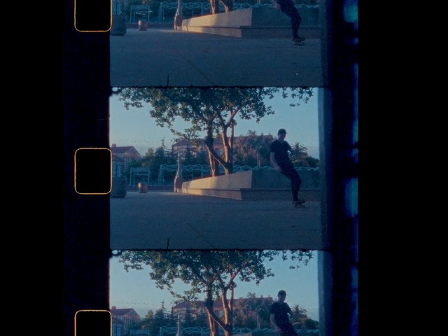 Video Reference: Sky, Blue, Tree, Window, Photography, Branch, Reflection, Room, Architecture, Square, Outdoor, Light, Street, Traffic, View, Background, Photo, Hanging, Sign, Snow, Sitting, City, Busy, Intersection, Standing, Pole, Green, Stop, White, Red, Bus, Text, Screenshot, Billboard