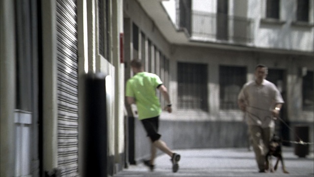 Video Reference: Photograph, Standing, Pedestrian, Snapshot, Public space, Walking, Town, Human settlement, Street, Urban area
