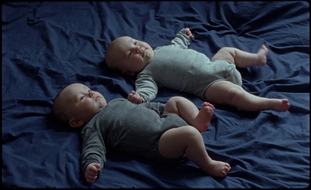 Video Reference: Child, Baby, Human, Sleep, Nap, Person, Bed, Indoor, Laying, Woman, Holding, Playing, Lying, Young, Stuffed, Riding, Bear, Man, Large, Cat, White, Sleeping, Blue, People, Ball, Toddler, Human face, Newborn, Clothing, Boy, Infant