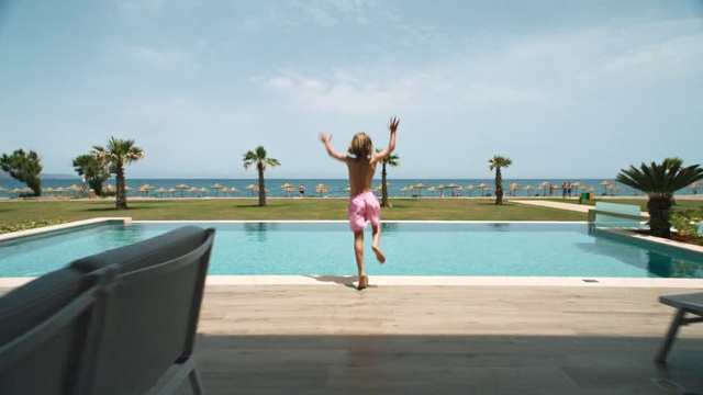 Video Reference: Swimming pool, Vacation, Leisure, Fun, Water, Resort, Summer, Sky, Tree, Jumping