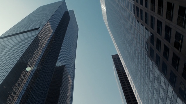Video Reference: Skyscraper, Metropolitan area, Architecture, Tower block, Urban area, Daytime, Metropolis, Commercial building, Blue, Building