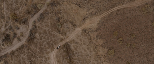 Video Reference: soil, aerial photography, geology, ecoregion, wood, grass, grass family, landscape, wildlife