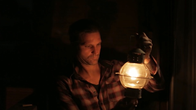 Video Reference: Darkness, Lighting, Light, Facial hair, Fun, Lantern, Lamp, Photography, Incandescent light bulb, Light fixture, Person