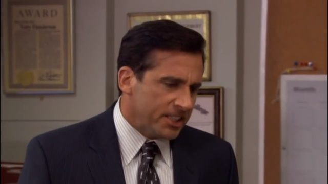 Video Reference: Suit, Hair, Forehead, Facial expression, Tie, Formal wear, Chin, White-collar worker, Tuxedo, Speech