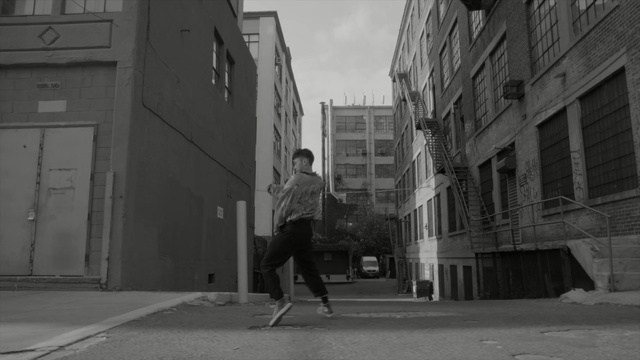 Video Reference: road, urban area, white, black, photograph, black and white, street, town, alley, infrastructure