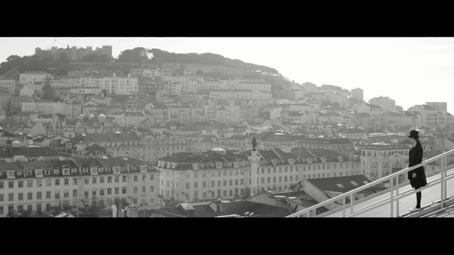 Video Reference: White, Black, Black-and-white, Monochrome photography, Landmark, Monochrome, Urban area, Photography, City, History, Person