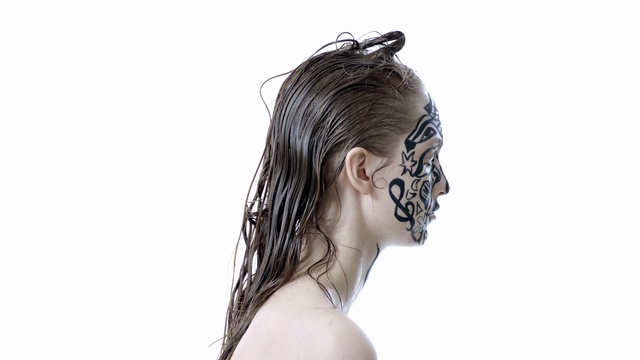 Video Reference: Hair, Face, Hairstyle, Head, Ear, Beauty, Headpiece, Forehead, Long hair, Headgear