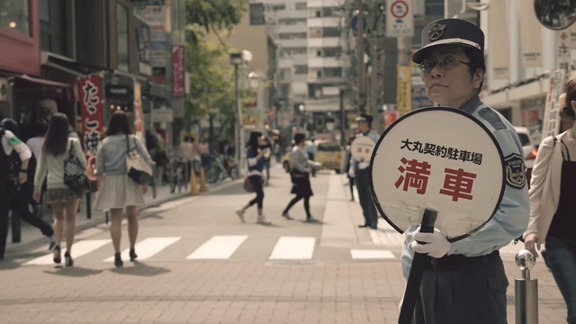 Video Reference: street, protest, crowd, pedestrian, event, city, vehicle, demonstration, recreation, Person