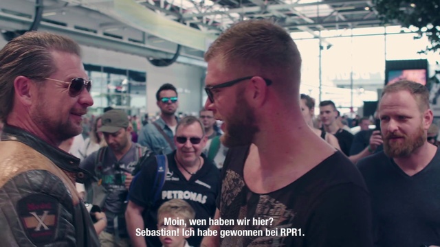 Video Reference: People, Eyewear, Event, Crowd, Glasses, Facial hair, Beard