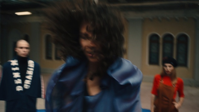 Video Reference: blue, snapshot, girl, crowd, fun, temple, event, Person