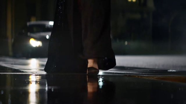 Video Reference: Light, Footwear, Darkness, Night, Lighting, Leg, Shoe, Reflection, Human leg, Atmosphere, Person, Table, Indoor, Food, Black, Man, Sitting, Standing, Holding, Counter, Glass, Dark, Water, Red, Computer, Woman, Board, Kitchen, White, Bus, Rain, Street, Feet, High heels, Clothing, Boot, Dress, Trousers, Sandal