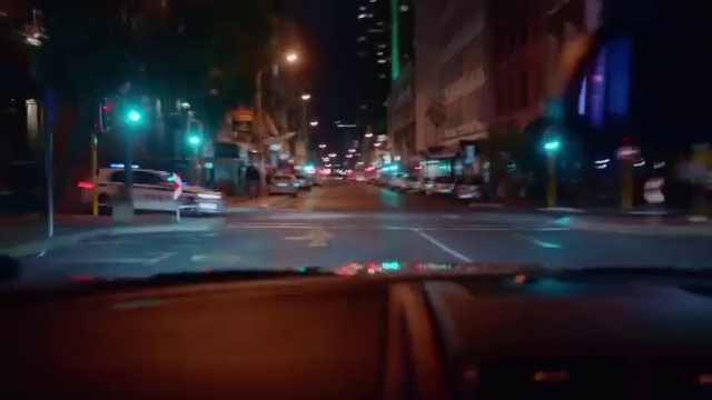 Video Reference: Night, Mode of transport, Lane, Metropolitan area, Light, Street light, Lighting, Windshield, Urban area, Downtown