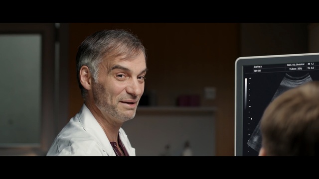 Video Reference: Screenshot, Technology, Electronic device, Media, Display device, Television, Multimedia, Gadget, White-collar worker, Fictional character, Person