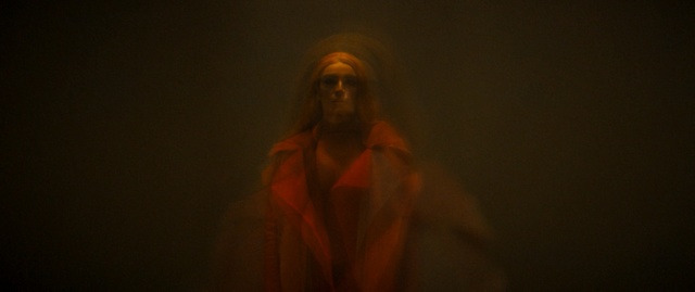 Video Reference: darkness, light, performance, human body, girl, performance art, midnight, scene, computer wallpaper, event, Person