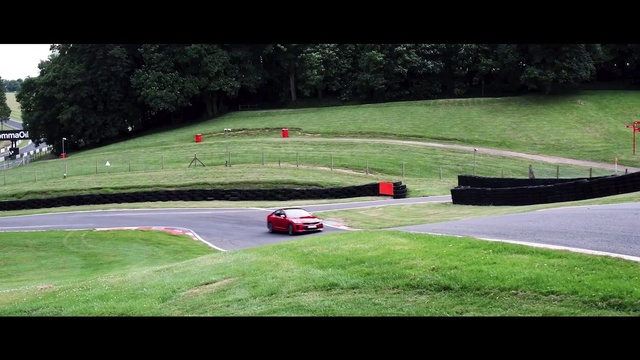 Video Reference: Vehicle, Race car, Race track, Sport venue, Car, Performance car, Grass, Automotive design, Sports car, Endurance racing (motorsport)