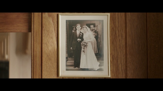 Video Reference: photograph, dress, gown, bride, picture frame, wedding, snapshot, photography, ceremony, wood